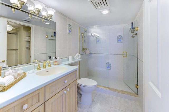 2571 NE Ocean Blvd Unit 104, Stuart, FL 34996 - full bathroom with tile patterned flooring, a stall shower, and vanity