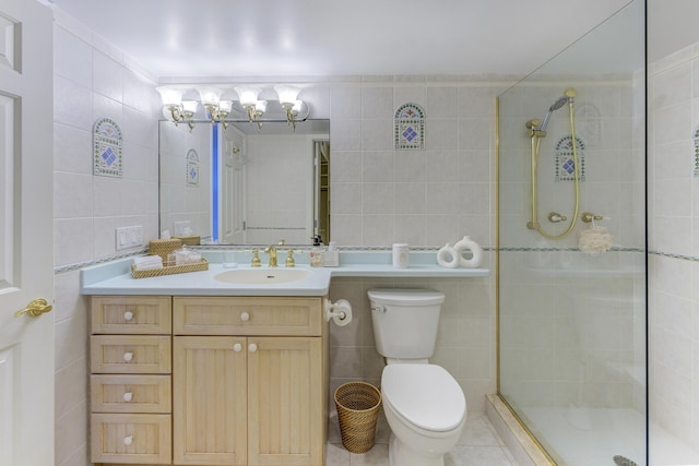 2571 NE Ocean Blvd Unit 104, Stuart, FL 34996 - full bath featuring tile walls, a stall shower, vanity, a chandelier, and tile patterned flooring