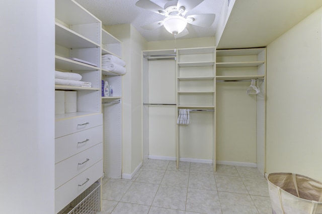 2571 NE Ocean Blvd Unit 104, Stuart, FL 34996 - spacious closet with a ceiling fan and light tile patterned floors