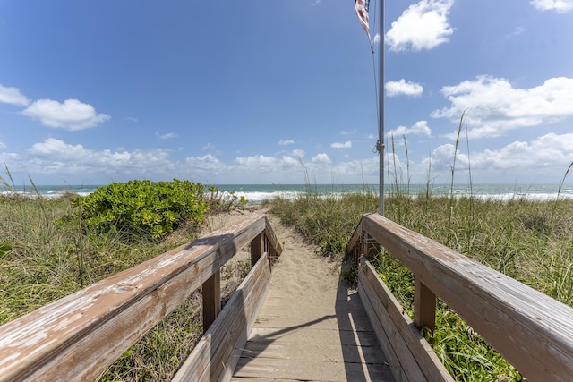 2571 NE Ocean Blvd Unit 104, Stuart, FL 34996 - view of community featuring view of water and beach