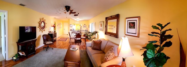6303 SE Williamsburg Dr Unit 201, Hobe Sound, FL 33455 - living room featuring wood finished floors