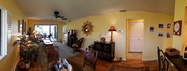 6303 SE Williamsburg Dr Unit 201, Hobe Sound, FL 33455 - living room featuring wood finished floors and a ceiling fan