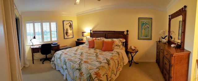 6303 SE Williamsburg Dr Unit 201, Hobe Sound, FL 33455 - bedroom with light colored carpet, ornamental molding, and ceiling fan