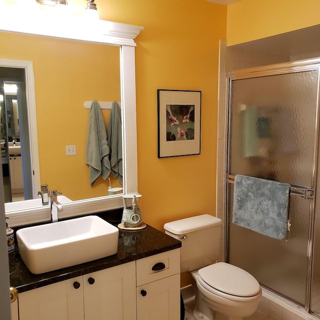 6303 SE Williamsburg Dr Unit 201, Hobe Sound, FL 33455 - full bathroom with vanity and a stall shower