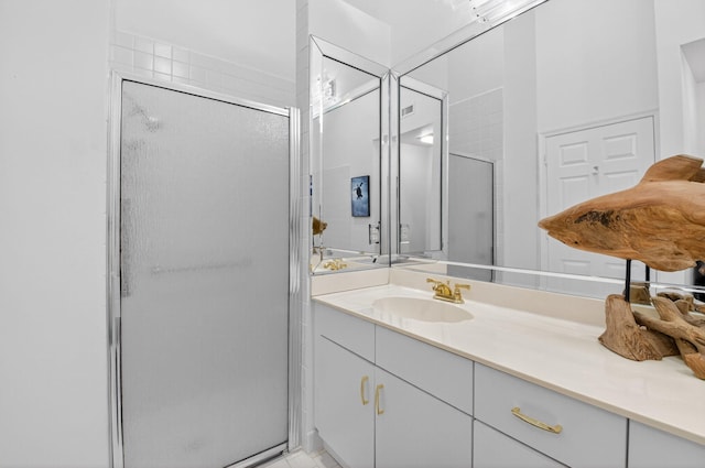 7585 Lexington Club Blvd Unit A, Delray Beach, FL 33446 - full bathroom featuring a stall shower and vanity