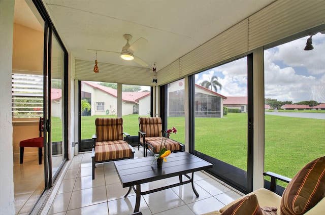 7585 Lexington Club Blvd Unit A, Delray Beach, FL 33446 - sunroom with a ceiling fan and healthy amount of natural light