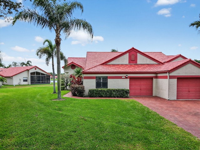 7585 Lexington Club Blvd Unit A, Delray Beach, FL 33446 - view of front of house featuring decorative driveway, stucco siding, a front yard, a garage, and a tiled roof