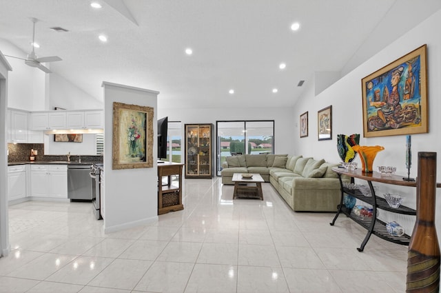 7585 Lexington Club Blvd Unit A, Delray Beach, FL 33446 - living room featuring ceiling fan, light tile patterned floors, recessed lighting, and high vaulted ceiling