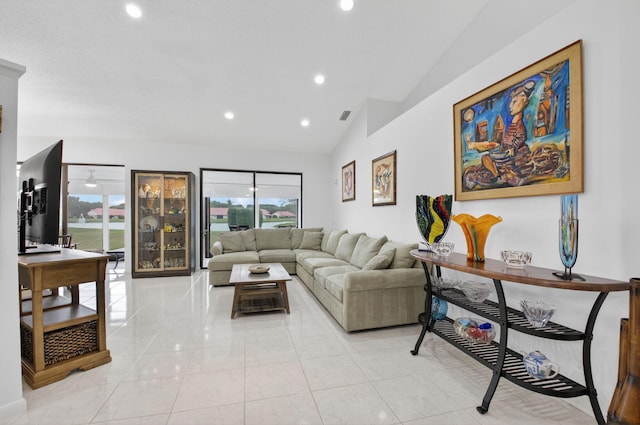 7585 Lexington Club Blvd Unit A, Delray Beach, FL 33446 - living area with vaulted ceiling, recessed lighting, and light tile patterned flooring