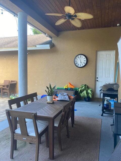 17183 80th St N, The Acreage, FL 33470 - view of patio / terrace featuring outdoor dining area and ceiling fan