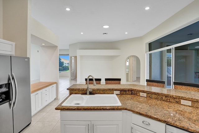 6809 Portside Dr, Boca Raton, FL 33496 - kitchen featuring stainless steel fridge, light tile patterned flooring, white cabinets, and recessed lighting