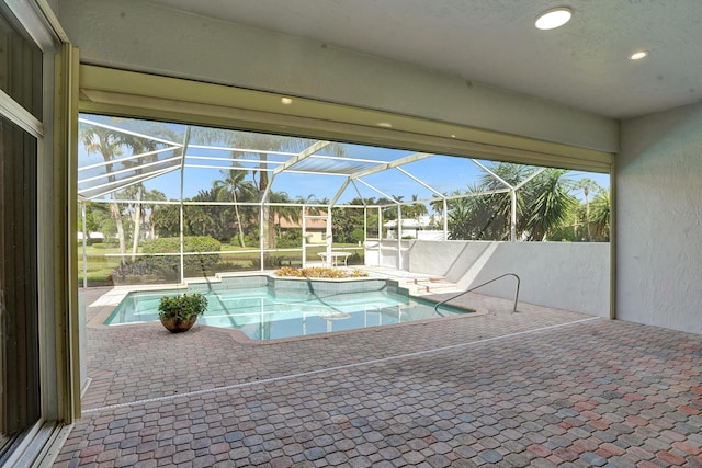 6809 Portside Dr, Boca Raton, FL 33496 - swimming pool with a jacuzzi, a patio, and a lanai