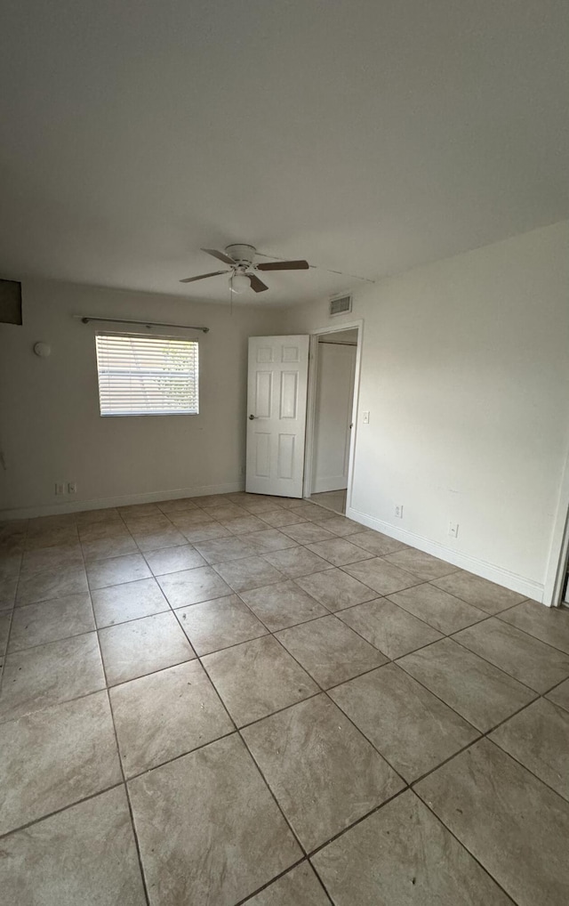 638 Saxony N, Delray Beach, FL 33446 - spare room featuring a ceiling fan and tile patterned flooring