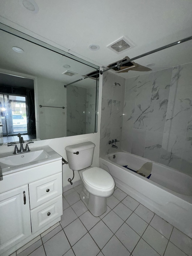 638 Saxony N, Delray Beach, FL 33446 - full bath featuring washtub / shower combination, vanity, and tile patterned floors