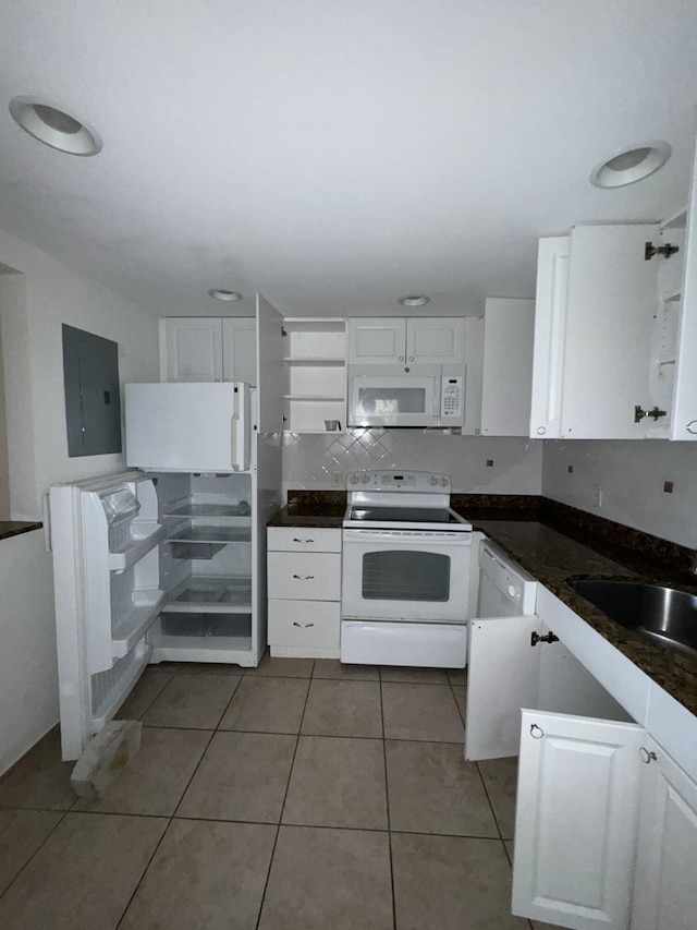 638 Saxony N, Delray Beach, FL 33446 - kitchen featuring white appliances, dark countertops, white cabinetry, and electric panel