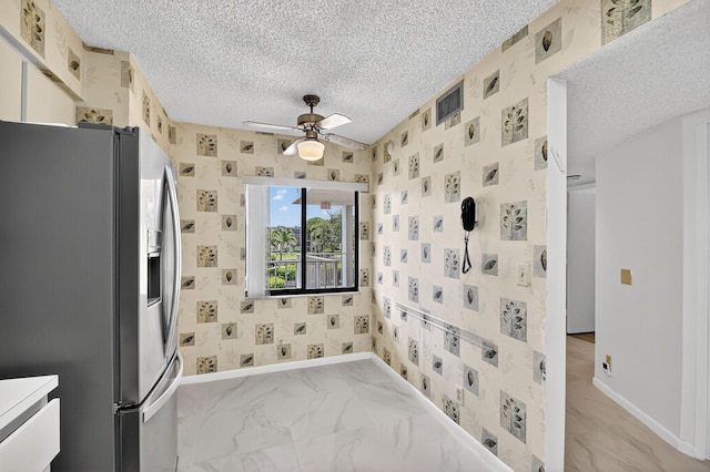 7290 Ashford Pl Unit 201, Delray Beach, FL 33446 - bathroom with a ceiling fan, wallpapered walls, and a textured ceiling