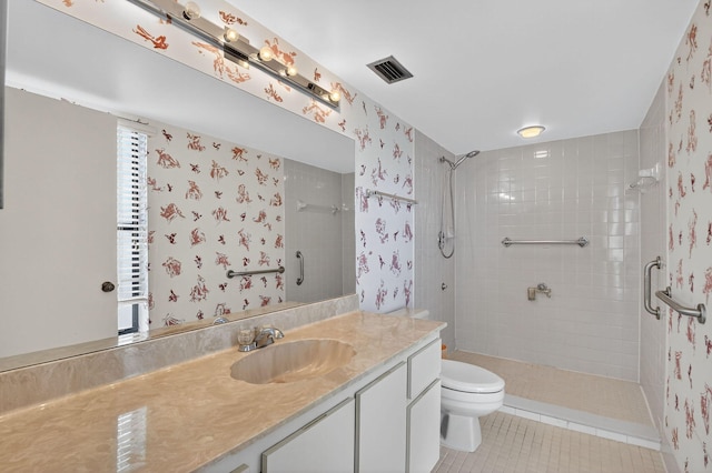7290 Ashford Pl Unit 201, Delray Beach, FL 33446 - bathroom with tile patterned flooring, a stall shower, vanity, and wallpapered walls