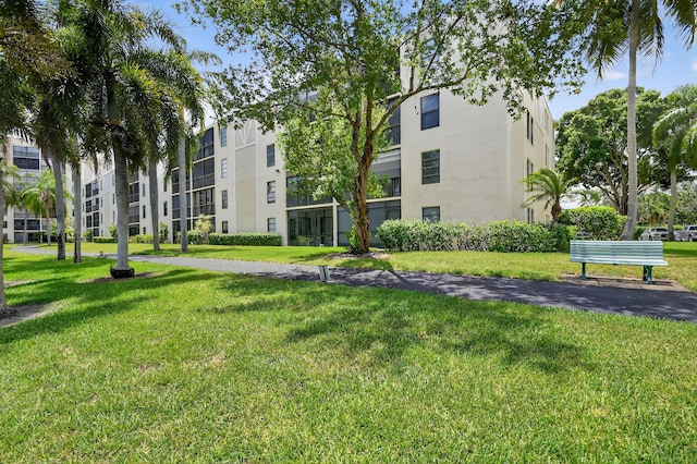 7290 Ashford Pl Unit 201, Delray Beach, FL 33446 - surrounding community with a lawn
