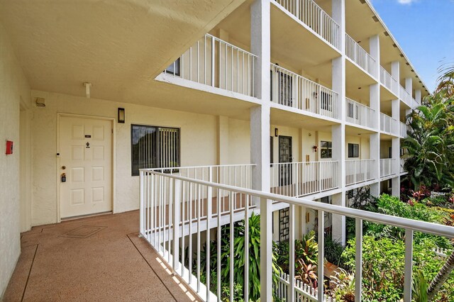 7290 Ashford Pl Unit 201, Delray Beach, FL 33446 - property entrance featuring stucco siding