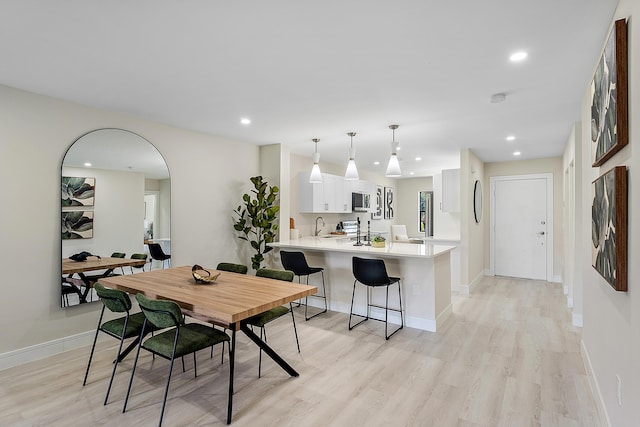 20 Southport Ln Unit D, Boynton Beach, FL 33436 - dining room with light wood-style flooring and recessed lighting