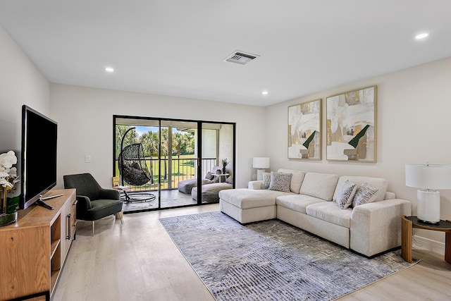 20 Southport Ln Unit D, Boynton Beach, FL 33436 - living area featuring light wood finished floors and recessed lighting