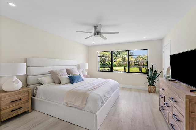 20 Southport Ln Unit D, Boynton Beach, FL 33436 - bedroom with light wood-style flooring, recessed lighting, and a ceiling fan
