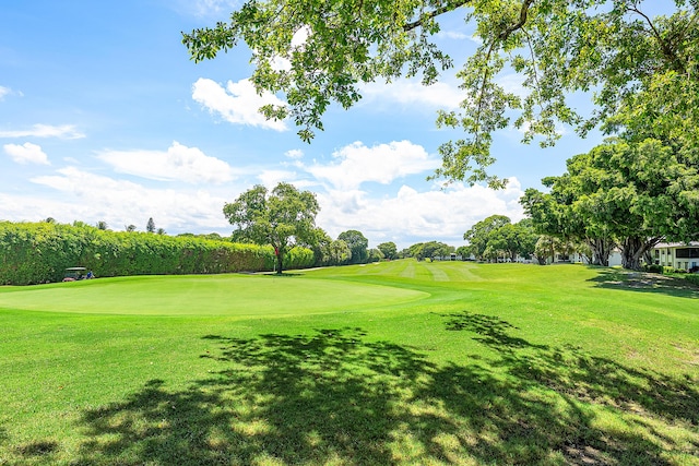 20 Southport Ln Unit D, Boynton Beach, FL 33436 - view of property's community with view of golf course and a yard