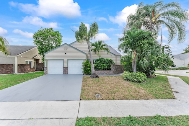 23157 Old Inlet Bridge Dr, Boca Raton, FL 33433 - view of front of house with driveway, a front lawn, and a garage