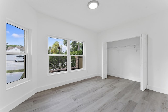 23157 Old Inlet Bridge Dr, Boca Raton, FL 33433 - unfurnished bedroom featuring light wood-type flooring and a closet
