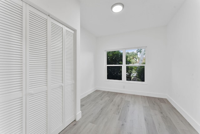 23157 Old Inlet Bridge Dr, Boca Raton, FL 33433 - unfurnished bedroom with light wood-style floors and a closet