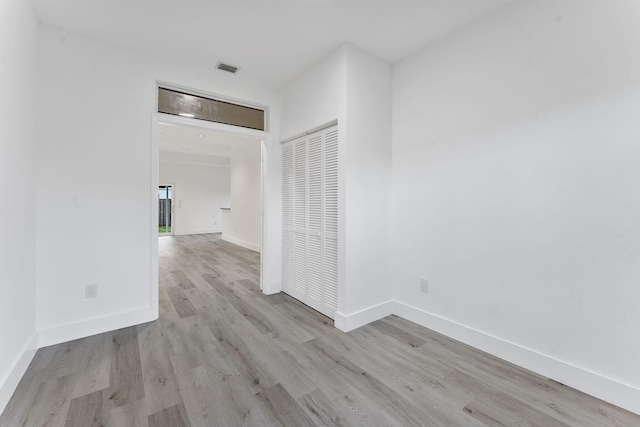 23157 Old Inlet Bridge Dr, Boca Raton, FL 33433 - unfurnished room with light wood-style floors and baseboards