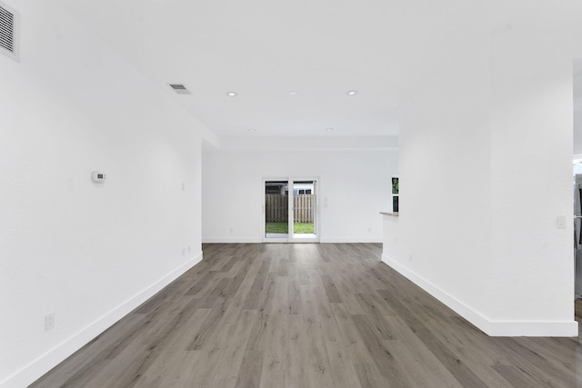 23157 Old Inlet Bridge Dr, Boca Raton, FL 33433 - empty room featuring light wood finished floors and recessed lighting