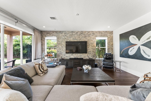 19335 Skyridge Cir, Boca Raton, FL 33498 - living area with wood finished floors, a textured ceiling, and recessed lighting