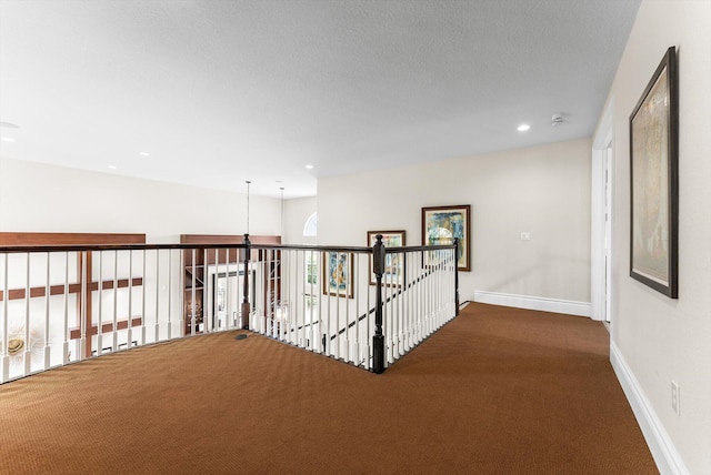19335 Skyridge Cir, Boca Raton, FL 33498 - corridor featuring carpet, recessed lighting, and an upstairs landing