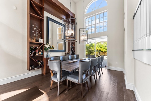19335 Skyridge Cir, Boca Raton, FL 33498 - dining space featuring dark wood-type flooring, plenty of natural light, and a chandelier