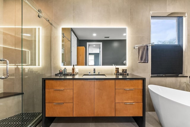 19335 Skyridge Cir, Boca Raton, FL 33498 - bathroom with a shower stall, vanity, a freestanding tub, and plenty of natural light