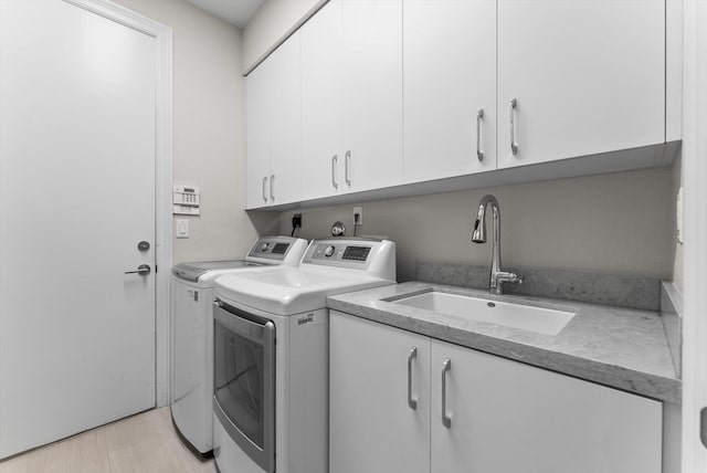 19335 Skyridge Cir, Boca Raton, FL 33498 - laundry room featuring cabinet space and independent washer and dryer