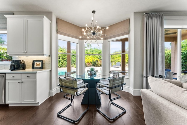 19335 Skyridge Cir, Boca Raton, FL 33498 - dining room with plenty of natural light, a chandelier, and dark wood-style flooring