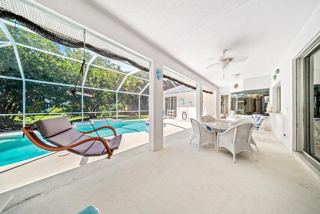 1104 SE Strathmore Dr, Port Saint Lucie, FL 34952 - swimming pool featuring a patio area, a ceiling fan, a lanai, and outdoor dining space