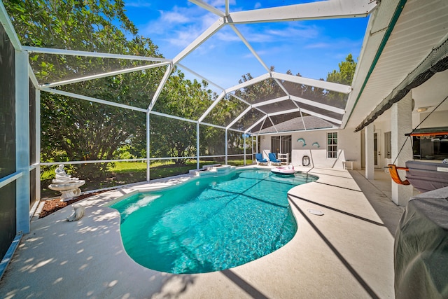 1104 SE Strathmore Dr, Port Saint Lucie, FL 34952 - swimming pool with a patio and a lanai