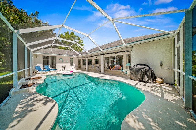 1104 SE Strathmore Dr, Port Saint Lucie, FL 34952 - swimming pool featuring a patio, a lanai, and ceiling fan