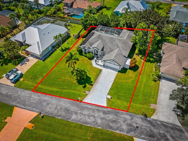 1104 SE Strathmore Dr, Port Saint Lucie, FL 34952 - aerial perspective of suburban area featuring property parcel outlined