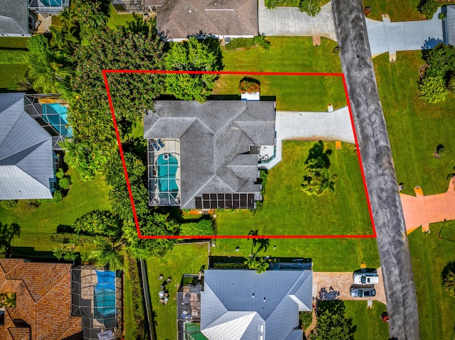 1104 SE Strathmore Dr, Port Saint Lucie, FL 34952 - aerial view of property's location with property parcel outlined and a pool