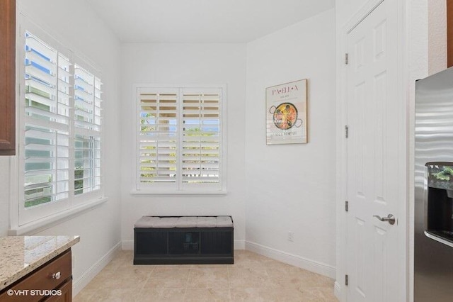 9155 SW Michele Way, Port Saint Lucie, FL 34987 - interior space featuring plenty of natural light and light tile patterned flooring