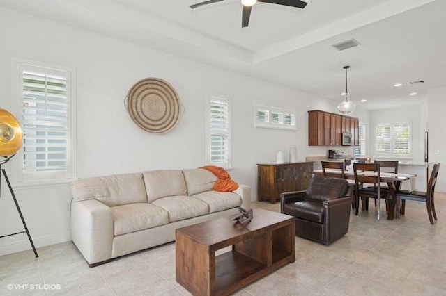 9155 SW Michele Way, Port Saint Lucie, FL 34987 - living area with ceiling fan and light tile patterned floors