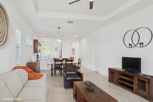 9155 SW Michele Way, Port Saint Lucie, FL 34987 - living area with light tile patterned floors, a ceiling fan, and recessed lighting