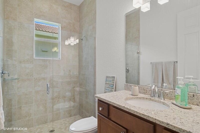 9155 SW Michele Way, Port Saint Lucie, FL 34987 - bathroom featuring vanity and a shower stall