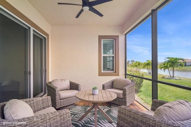 9155 SW Michele Way, Port Saint Lucie, FL 34987 - sunroom featuring a water view, a ceiling fan, and healthy amount of natural light
