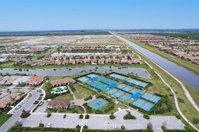9155 SW Michele Way, Port Saint Lucie, FL 34987 - aerial overview of property's location featuring a nearby body of water and nearby suburban area