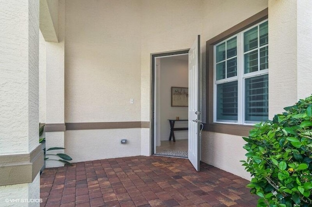 9155 SW Michele Way, Port Saint Lucie, FL 34987 - entrance to property with stucco siding